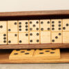 Hand crafted Wood Domino Set. The set includes the standard double 0 up to the double 6. This set includes a custom wooden box with sliding lid to store the dominoes.